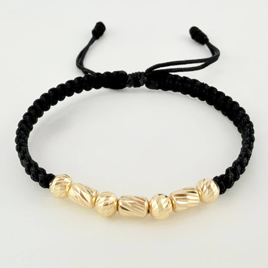 Pulsera Negra Cilindros Interceptos 7und / 4mm-5mm Oro Amarillo 18K (A.C)