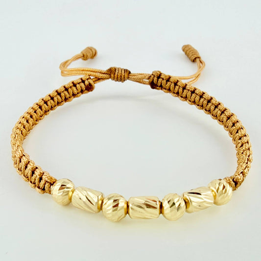 Pulsera Dorada Cilindros Interceptos 7und / 4mm-5mm Oro Amarillo 18K (A.C)