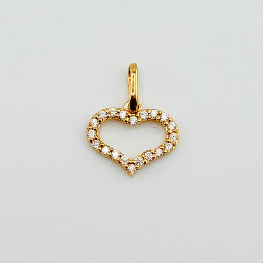 Dije Silueta Corazón Tupido 0.75gr / 1/2 in / Oro Amarillo 18K ©