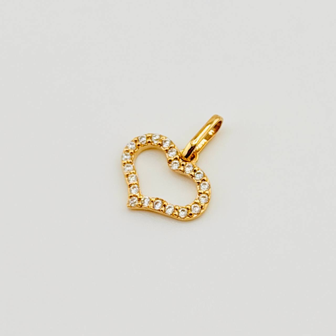 Dije Silueta Corazón Tupido 0.75gr / 1/2 in / Oro Amarillo 18K © Dije Silueta Corazón Tupido 0.75gr / 1/2 in / Oro Amarillo 18K ©