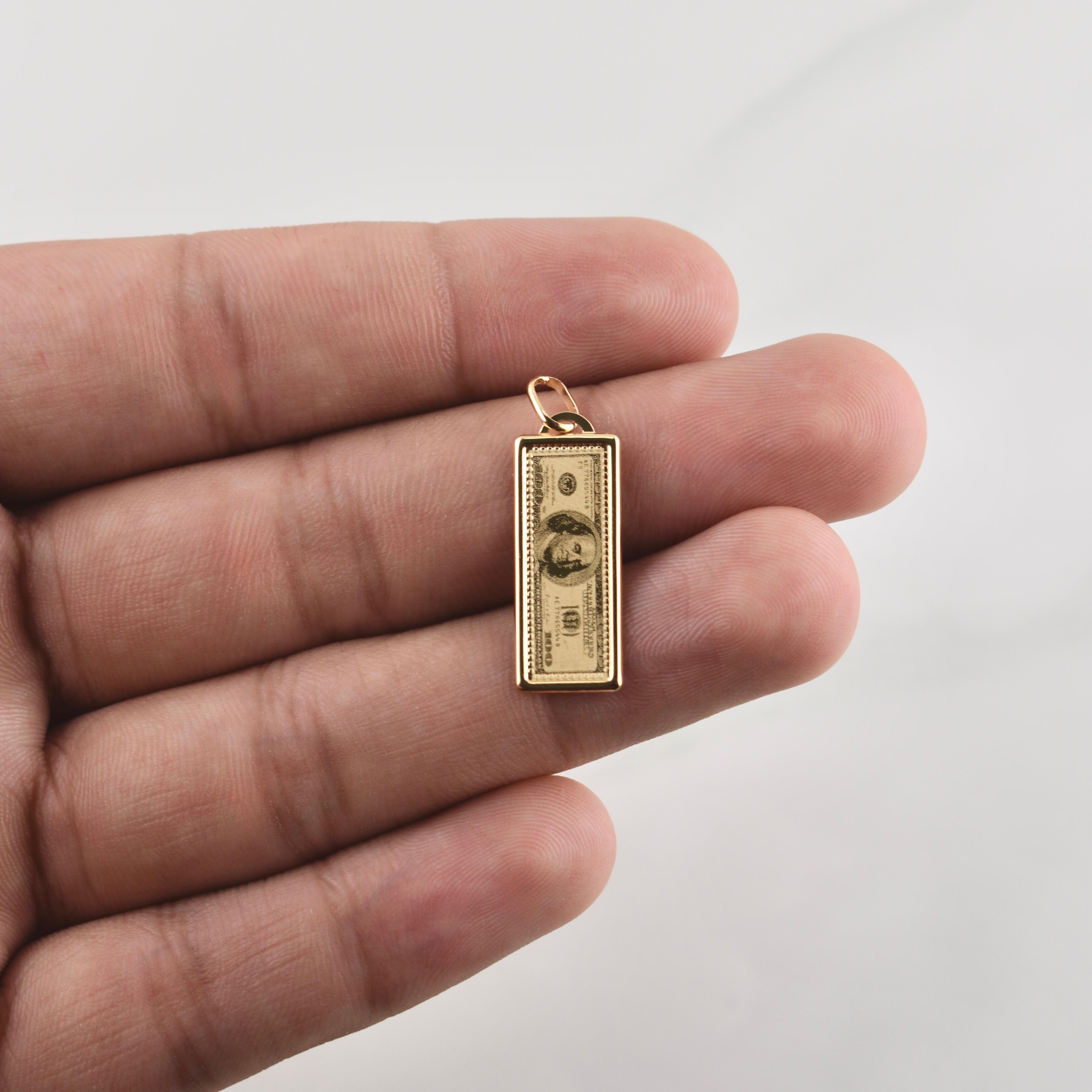 Dije 100 Dolares 1.1gr / 1 1/4 in / Oro Amarillo +4 18K Dije 100 Dolares 1.1gr / 1 1/4 in / Oro Amarillo +4 18K