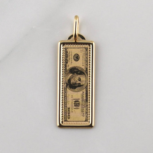 Dije 100 Dolares 1.1gr / 1 1/4 in / Oro Amarillo +4 18K