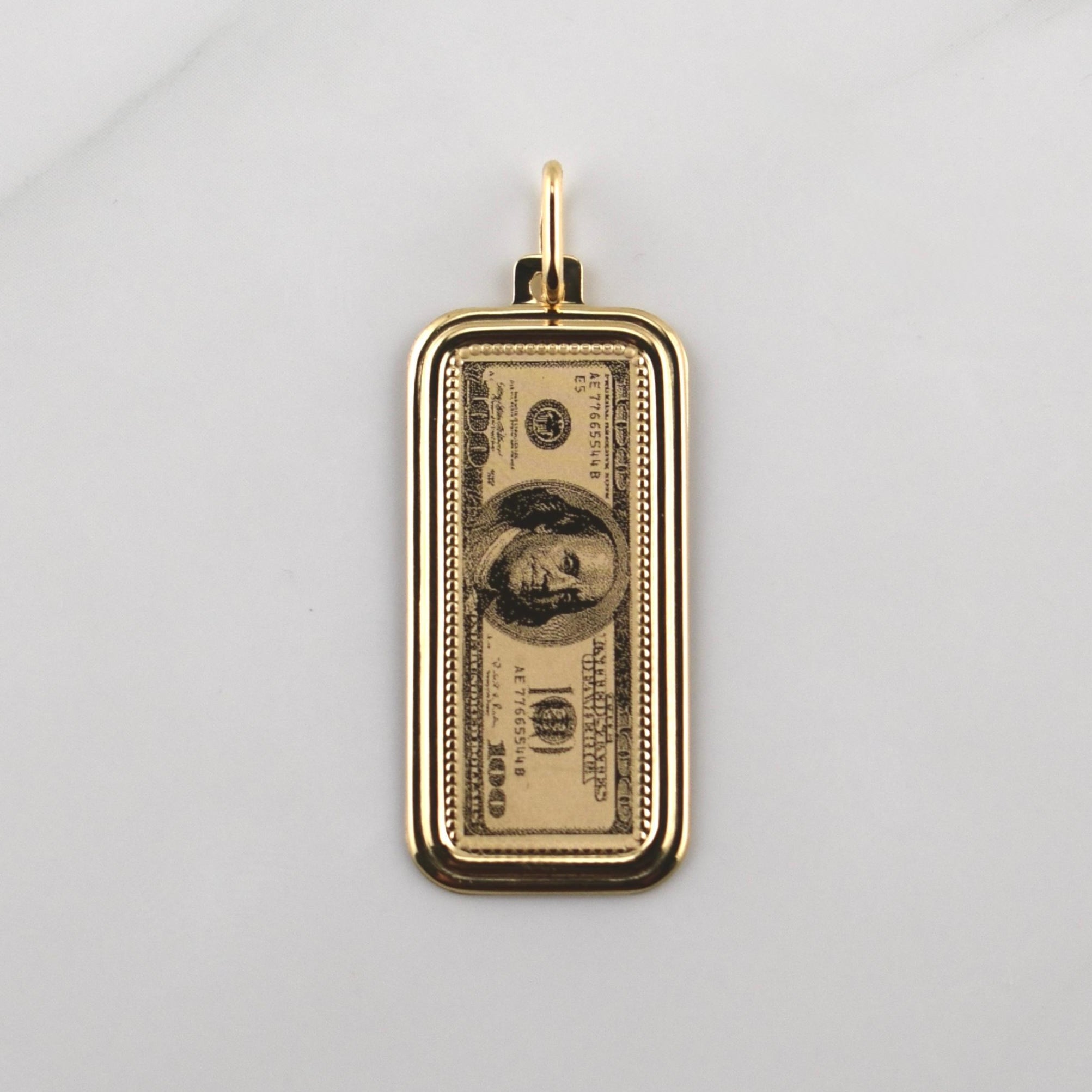 Dije 100 Dolares 2.3gr / 1 1/2 in / Oro Amarillo +4 18K Dije 100 Dolares 2.3gr / 1 1/2 in / Oro Amarillo +4 18K