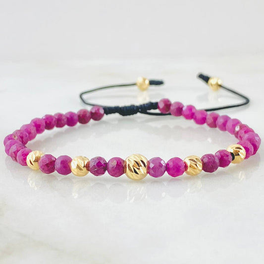 Pulsera Negra Rubies Vermelion 0.8gr / Oro Amarillo 18K (A.C)