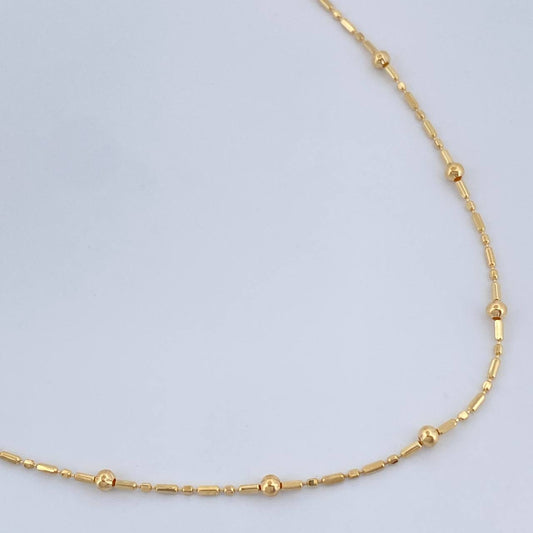 Cadena Morse Bolas 1.95gr / 17 1/2 in / 0.7mm Oro Amarillo +3 18K %