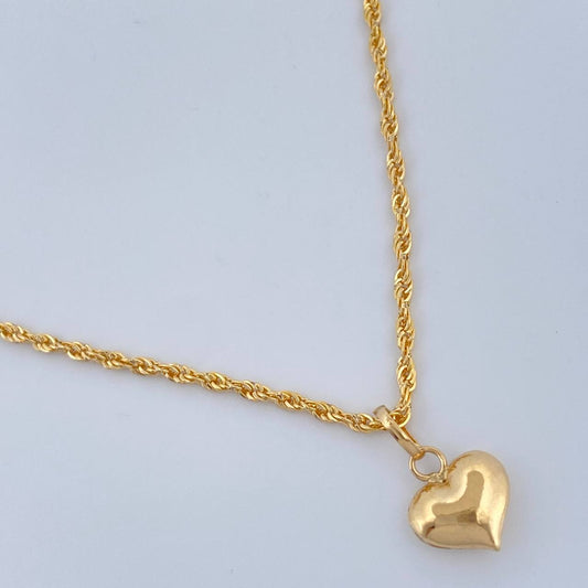 Set Cadena y Dije Lazo + Corazon 1.35gr / 15 3/4 in / Oro Amarillo 18K $