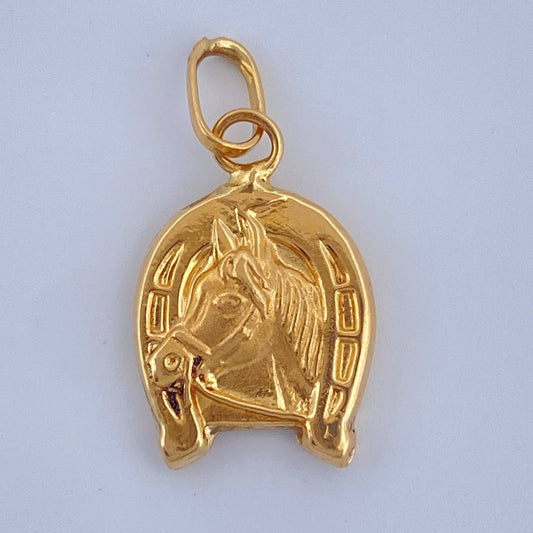 Dije Herradura Caballo 0.65gr / 3/4 in / Oro Amarillo 18K $
