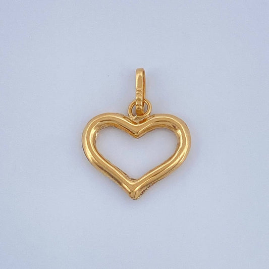Dije Silueta Corazon 0.45gr / 3/4 in / Oro Amarillo 18K $