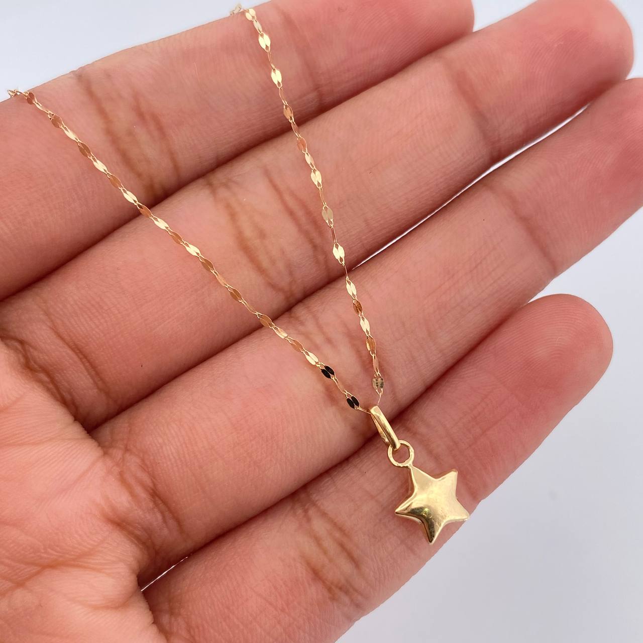 Set Cadena y Dije Flor Espejo+Estrella 0.65gr / 17 3/4 in / 0.4mm Oro Amarillo 18K $ Set Cadena y Dije Flor Espejo+Estrella 0.65gr / 17 3/4 in / 0.4mm Oro Amarillo 18K $