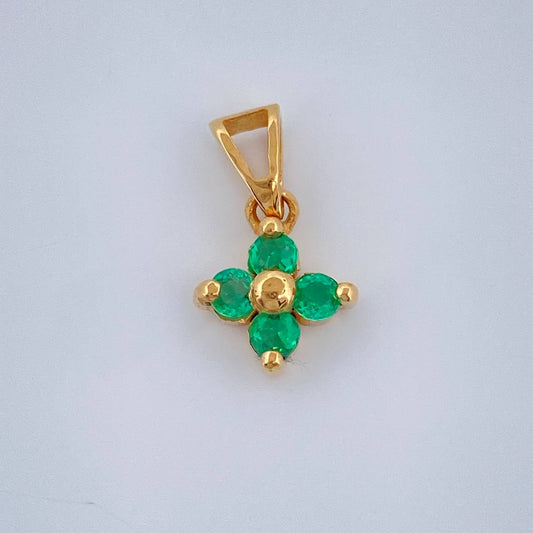 Dije Flor Esmeralda 0.8gr / 1/2 in / Oro Amarillo 18K &