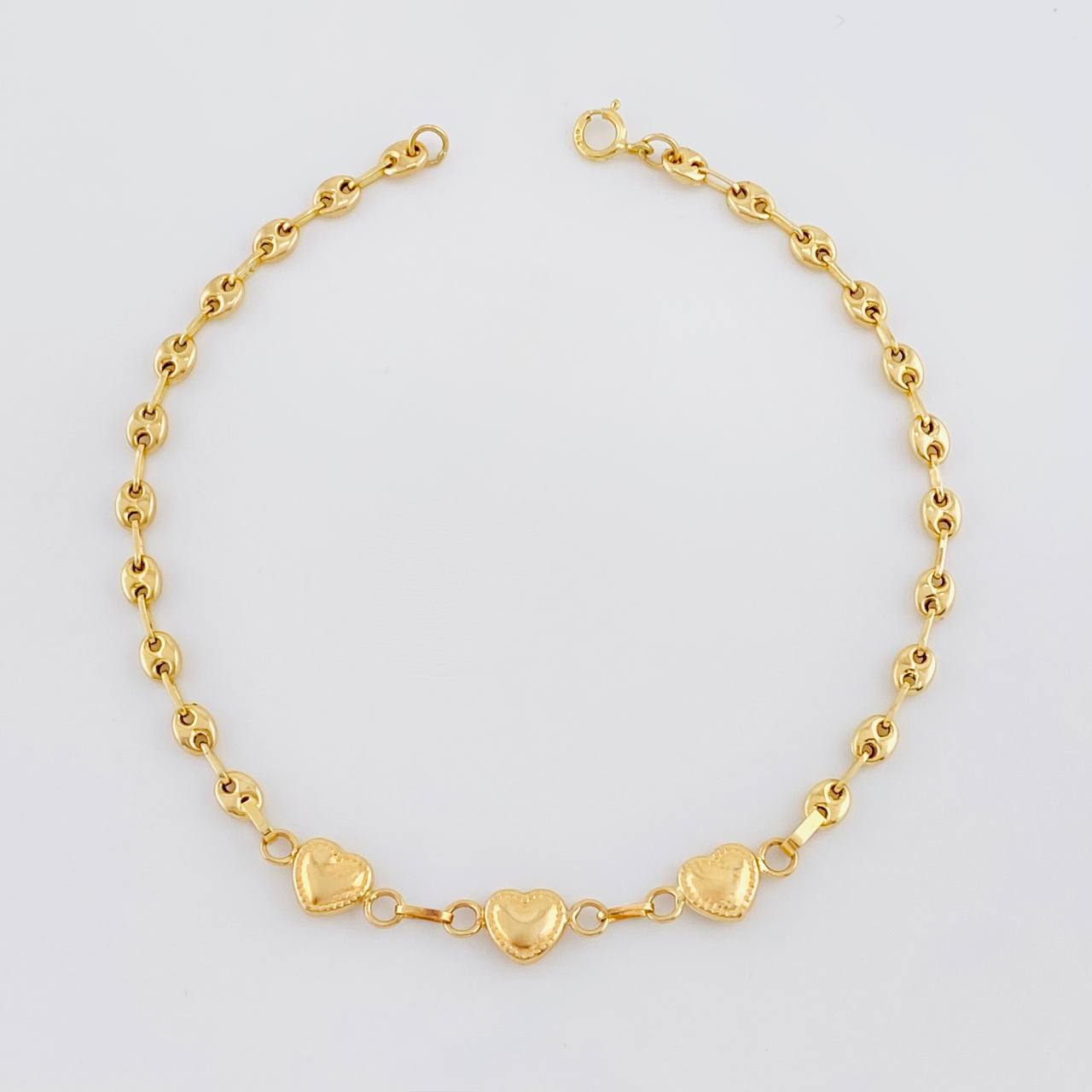 Pulso GC Trio de Corazones 2.2g / 7 1/4 in / 3.1mm Oro Amarillo 18K