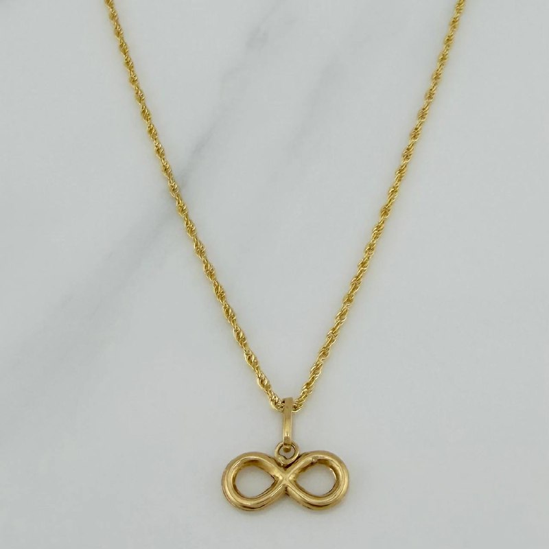 Set Cadena Lazo + Dije Infinito / 1,35 gr / 18 in Oro Amarillo 18K