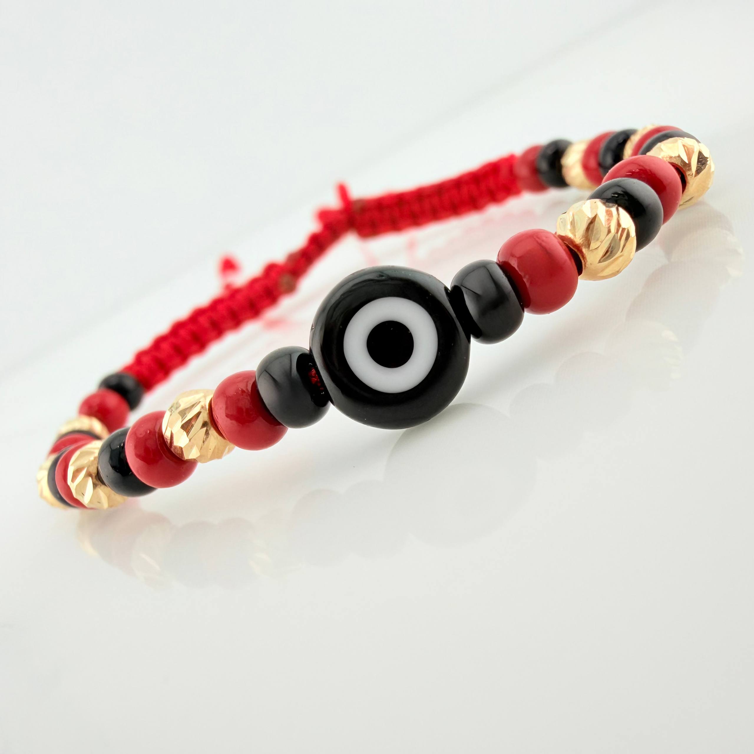 Pulsera Tejida Roja Ojo Turco Oro Amarillo 18K
