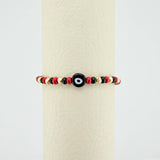 Red Woven Bracelet with Turkish Eye in 18K Yellow Gold