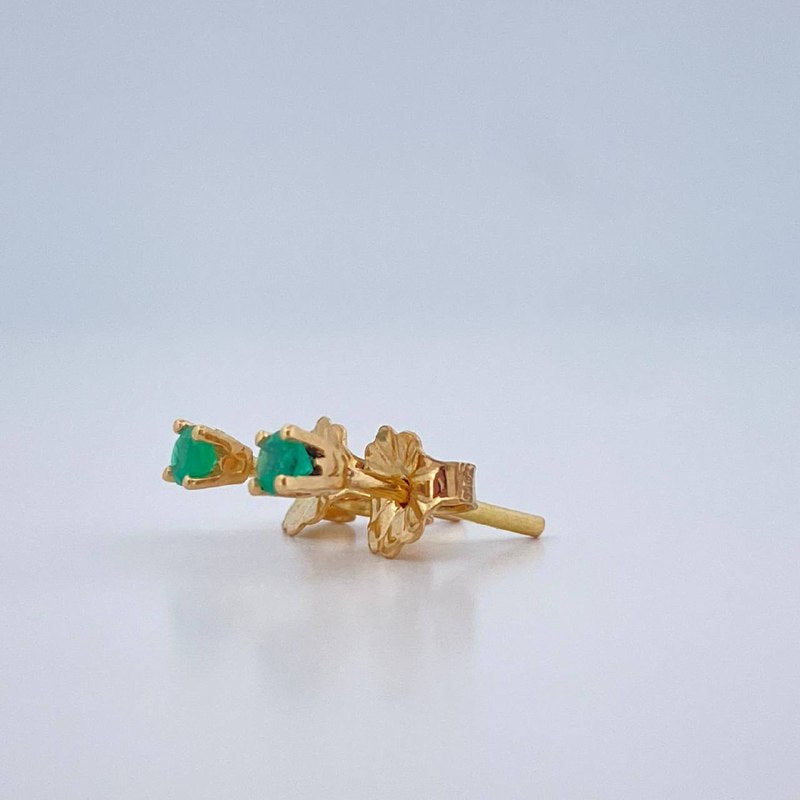 Topos Cuatro Garras Esmeralda 0.7gr / Oro Amarillo 18K %