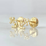 Topos Cruz Anclada 0.75gr / 7.3mm Circones Blancos Oro Amarillo 18K