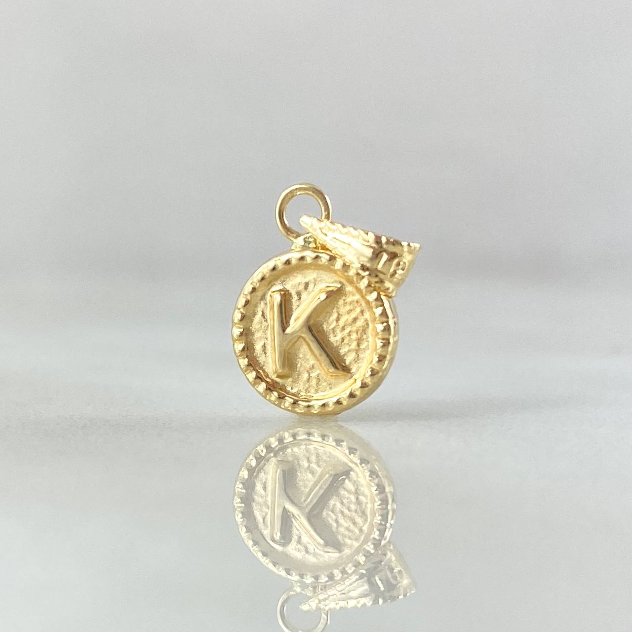 Dije Letra K 0.4gr / 1.4cm / Circulo Cargador Bordeado Oro Amarillo 18K