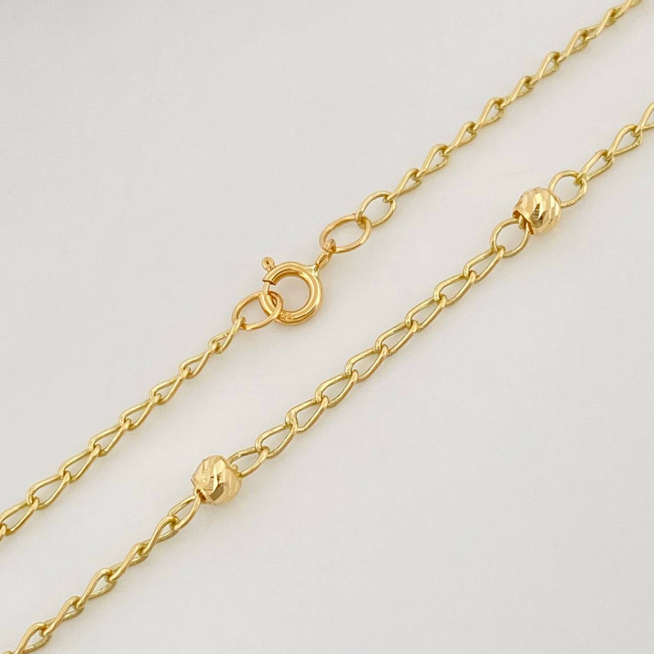 Tobillera Espiga Bolas 1.65 g / 9 3/4 in / 3 mm Oro Amarillo 18K