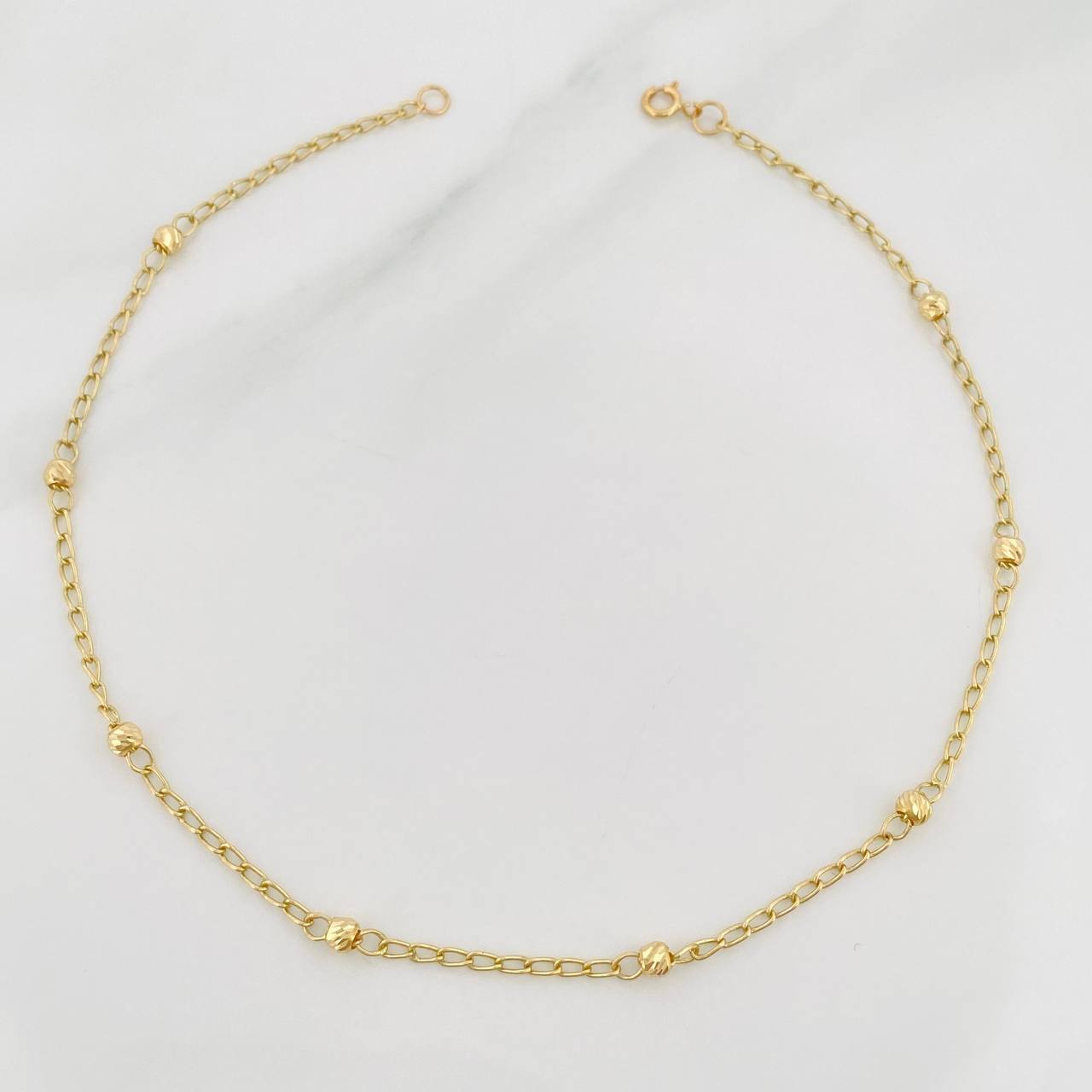 Tobillera Espiga Bolas 1.65 g / 9 3/4 in / 3 mm Oro Amarillo 18K