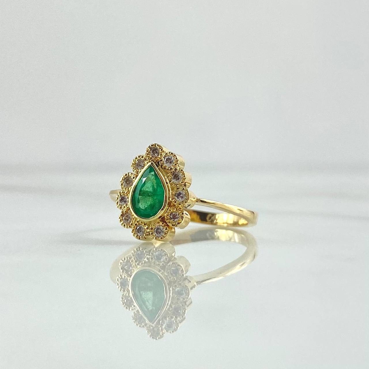 Halo Ring In Pear 3.65gr / Size 7 1/4 / Emeralds 46Pts - White Zircons 18K Yellow Gold ©