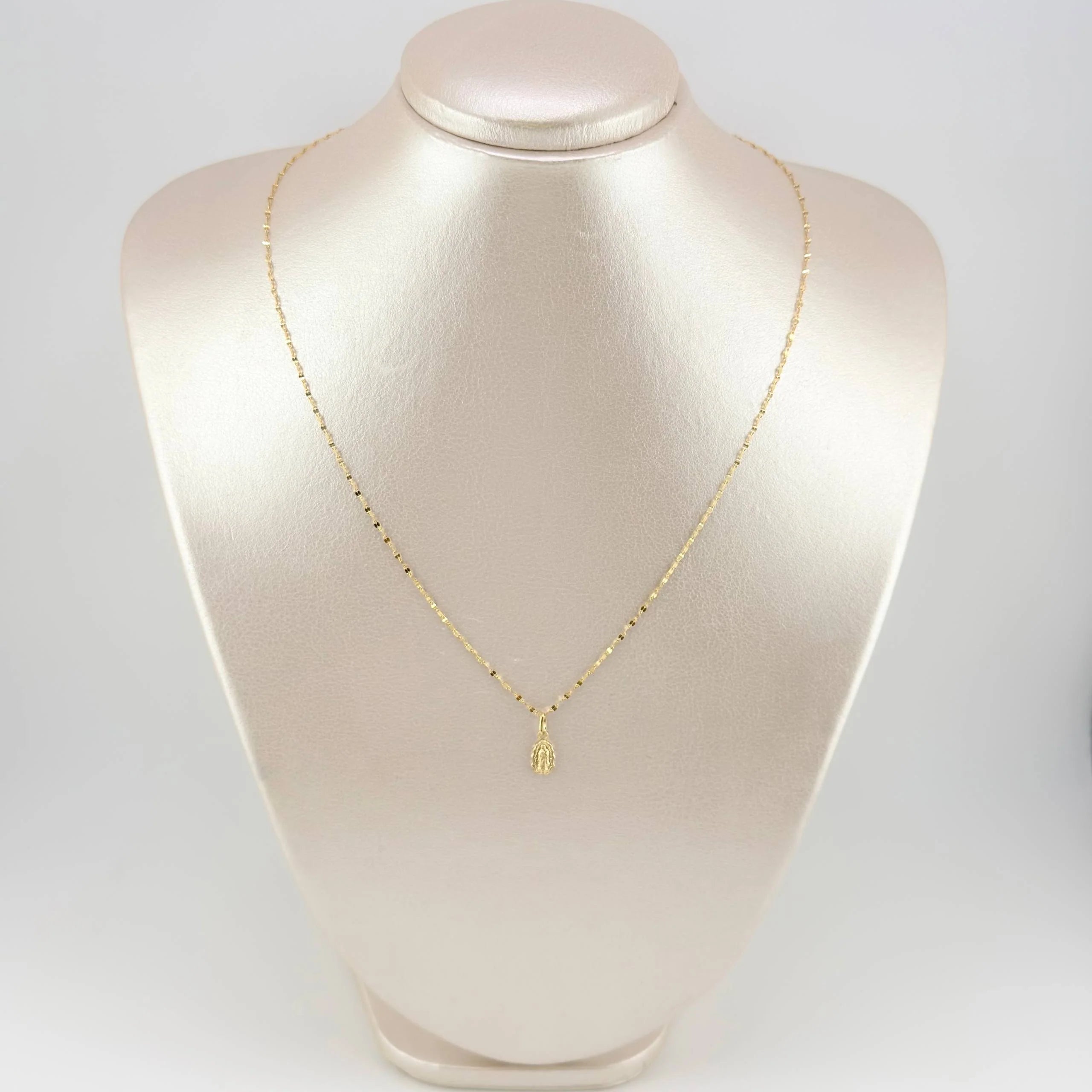 Set Cadena Flor De Espejo + Dije Dije Virgen De La Guadalupe Redondo / 1,35gr / 18 in Oro Amarillo 18K