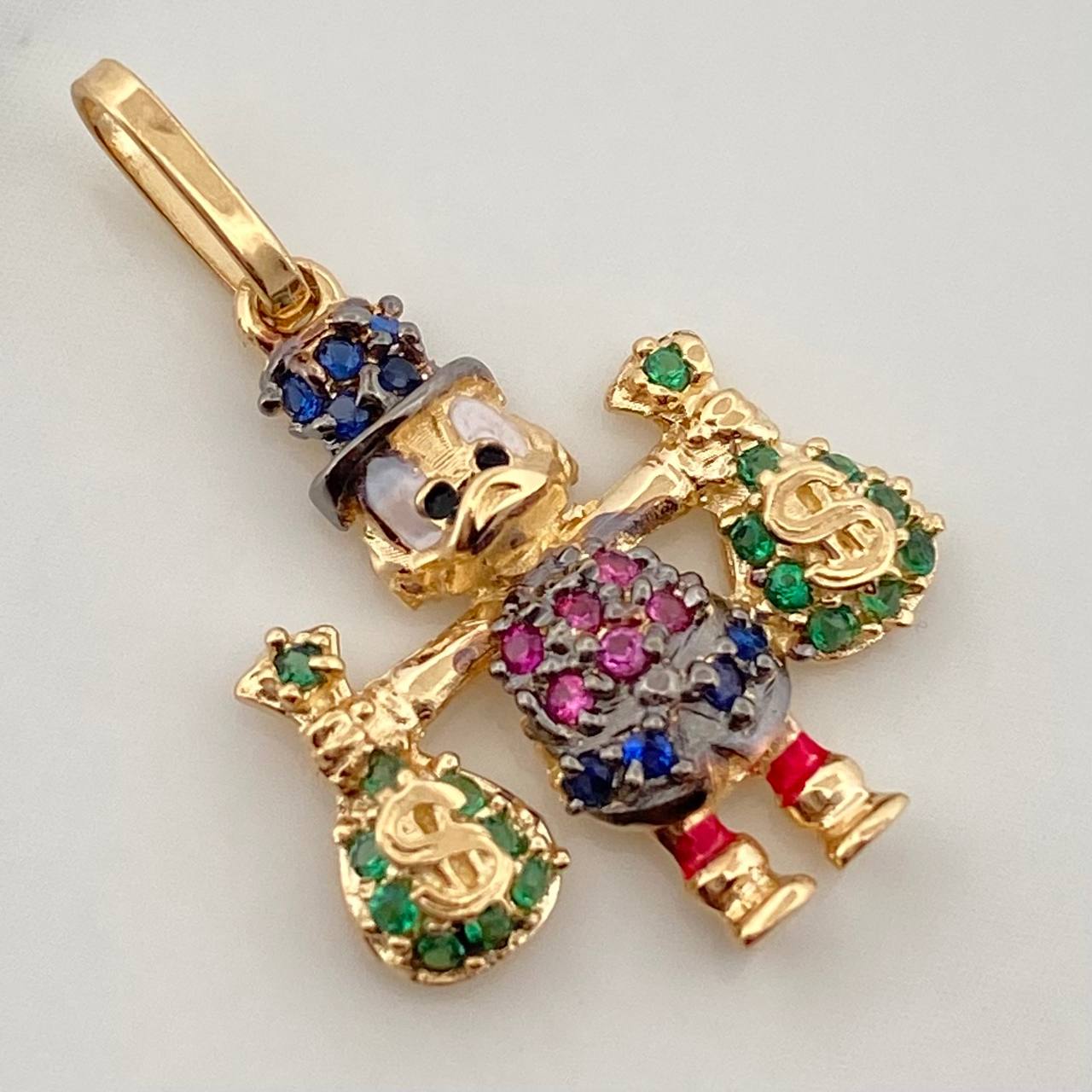 Dije Pato Bolsas de Dinero 1.7gr / 1 in / Dos Oros Negro Amarillo 18K %