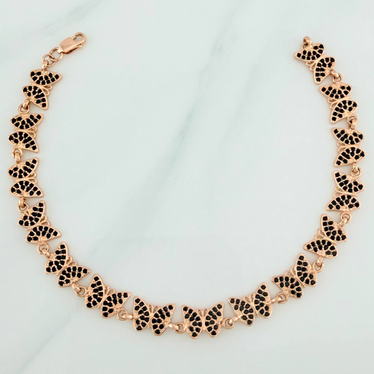 Pulso Mariposas 10.25gr / 2 3/4 in / Oro Rosa 18K $