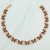 Pulso Mariposas 10.25gr / 2 3/4 in / Oro Rosa 18K $