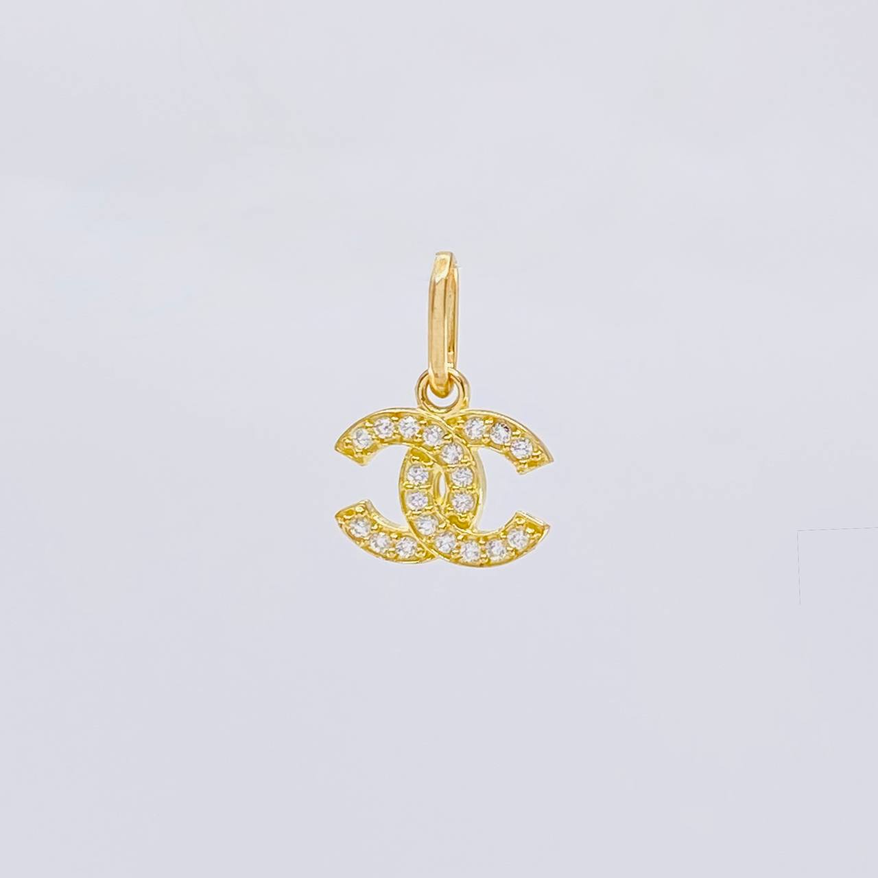 Dije Cc 0.65 g / 1/2 in Oro Amarillo 18K