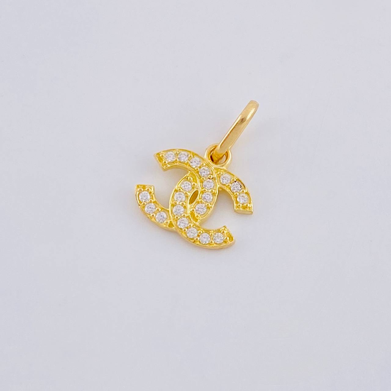 Dije Cc 0.65 g / 1/2 in Oro Amarillo 18K
