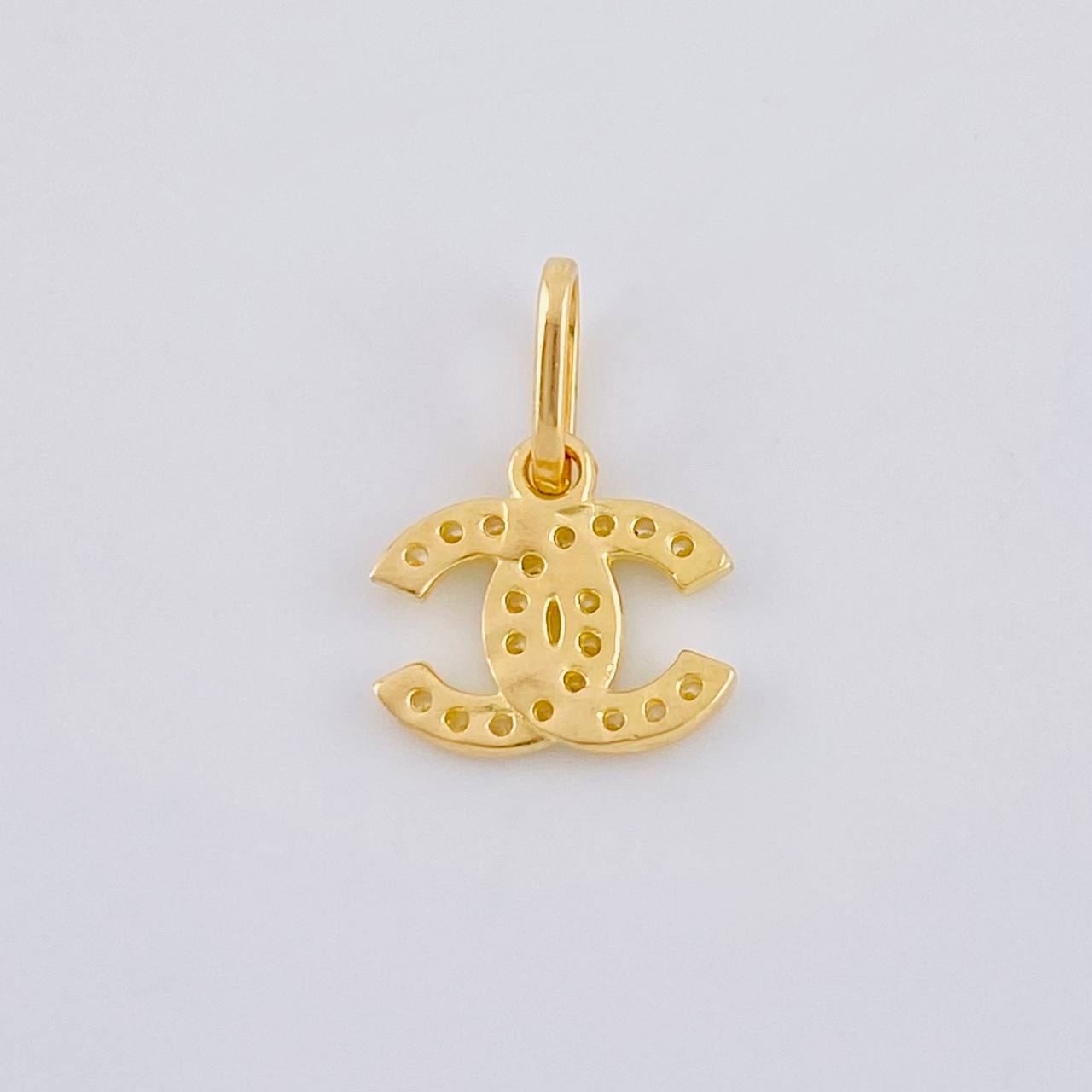 Dije Cc 0.65 g / 1/2 in Oro Amarillo 18K