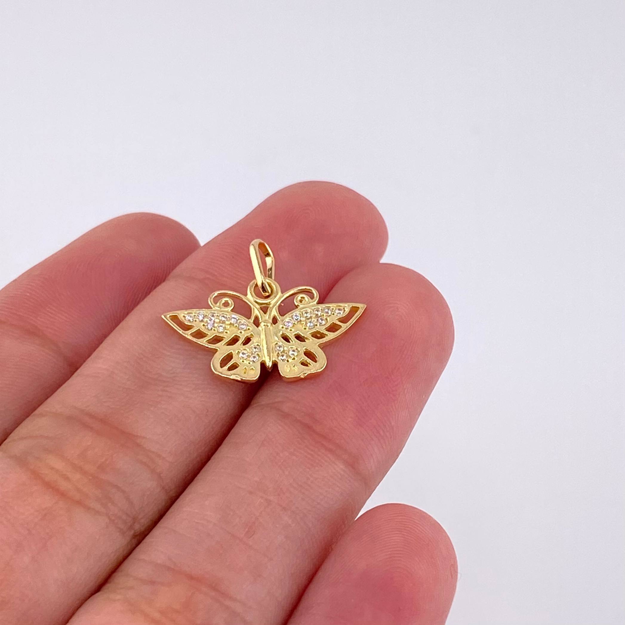 Dije Mariposa 1.35 g / 1/2 in Oro Amarillo 18K