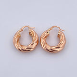 Candongas Emmi 4.6gr / 2.4cm / Entorchadas Oro Rosa 18K $