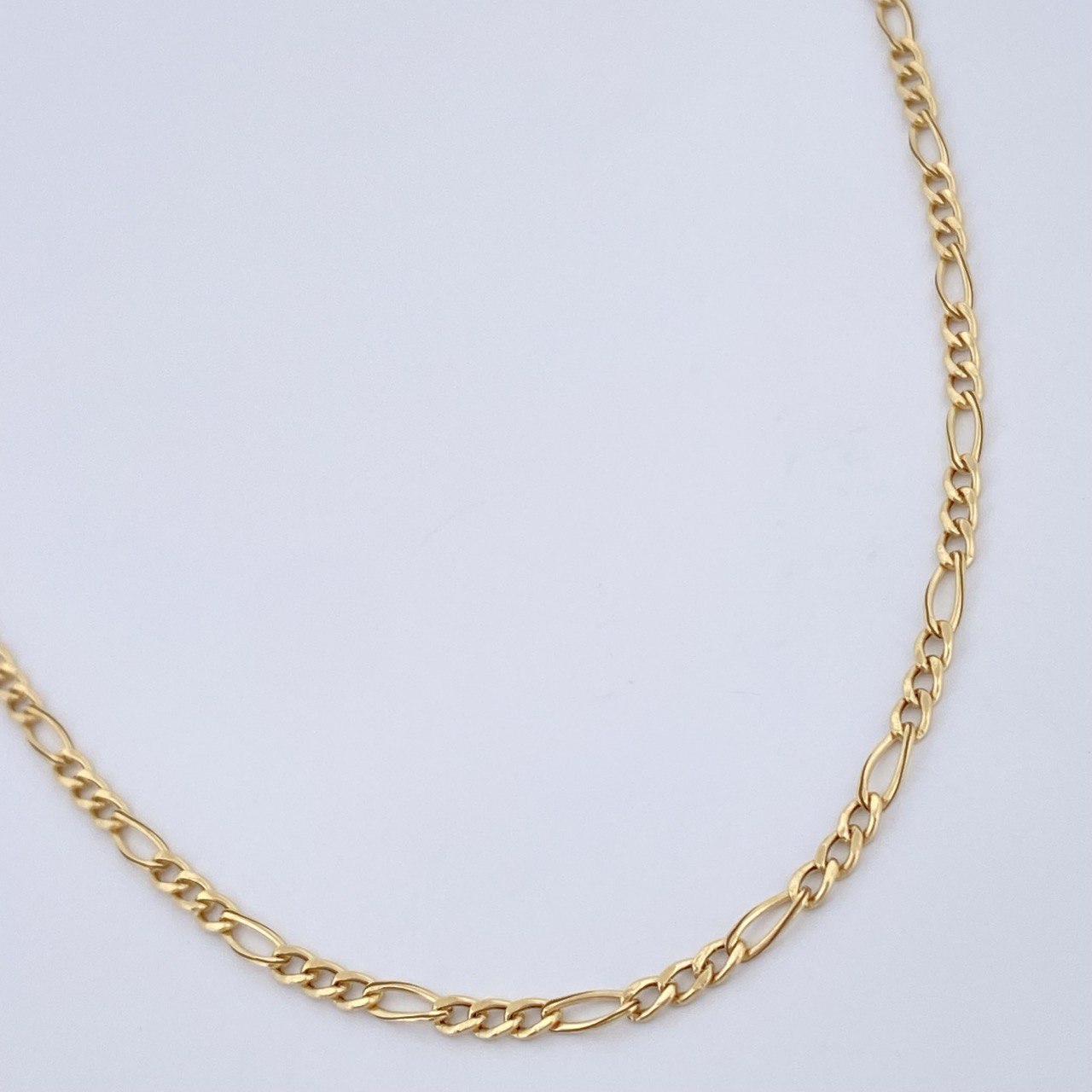 Figaro Chain 1.9gr / 23.6in / 18K Gold +1 &