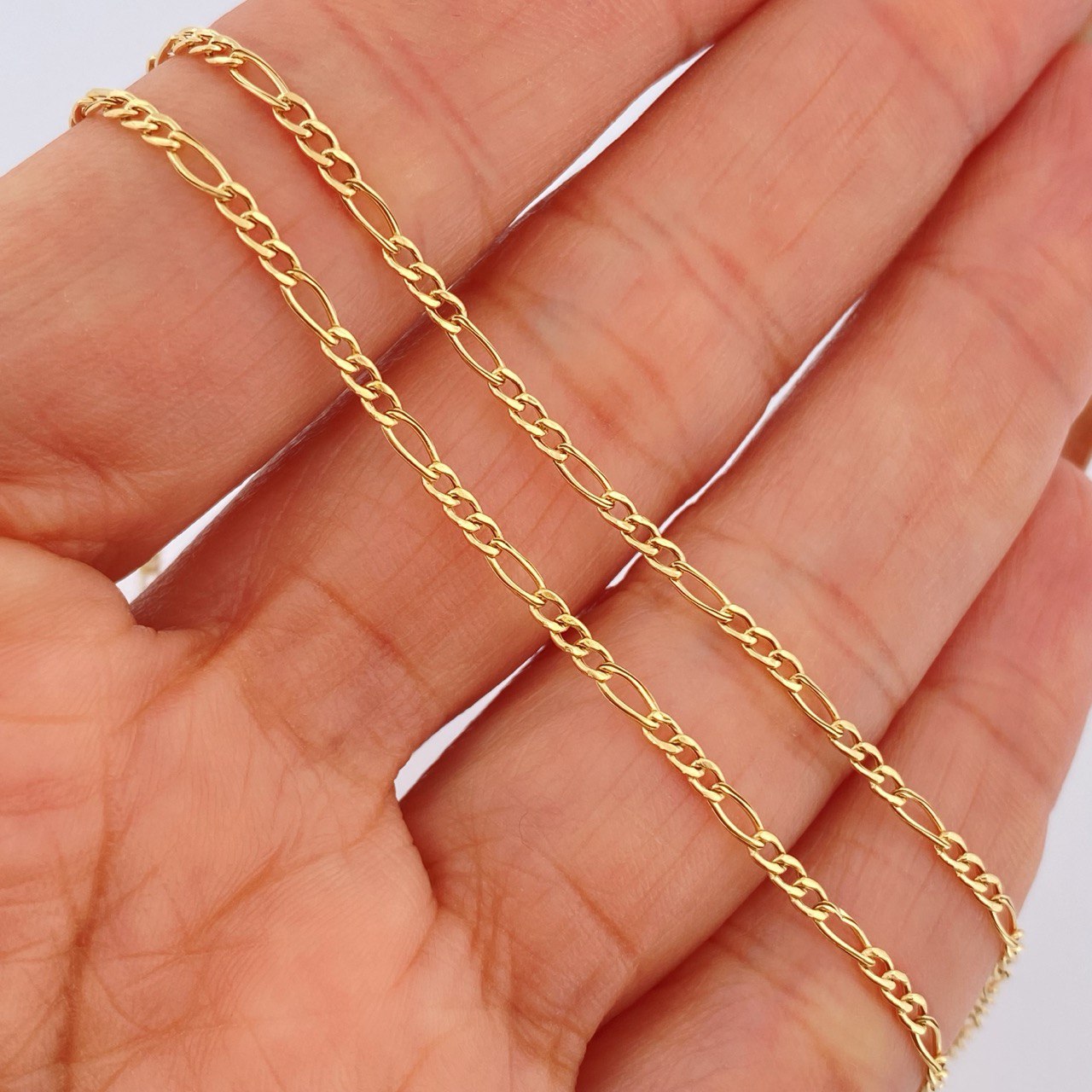 Figaro Chain 1.5gr / 19.7in / 18K Gold +1$