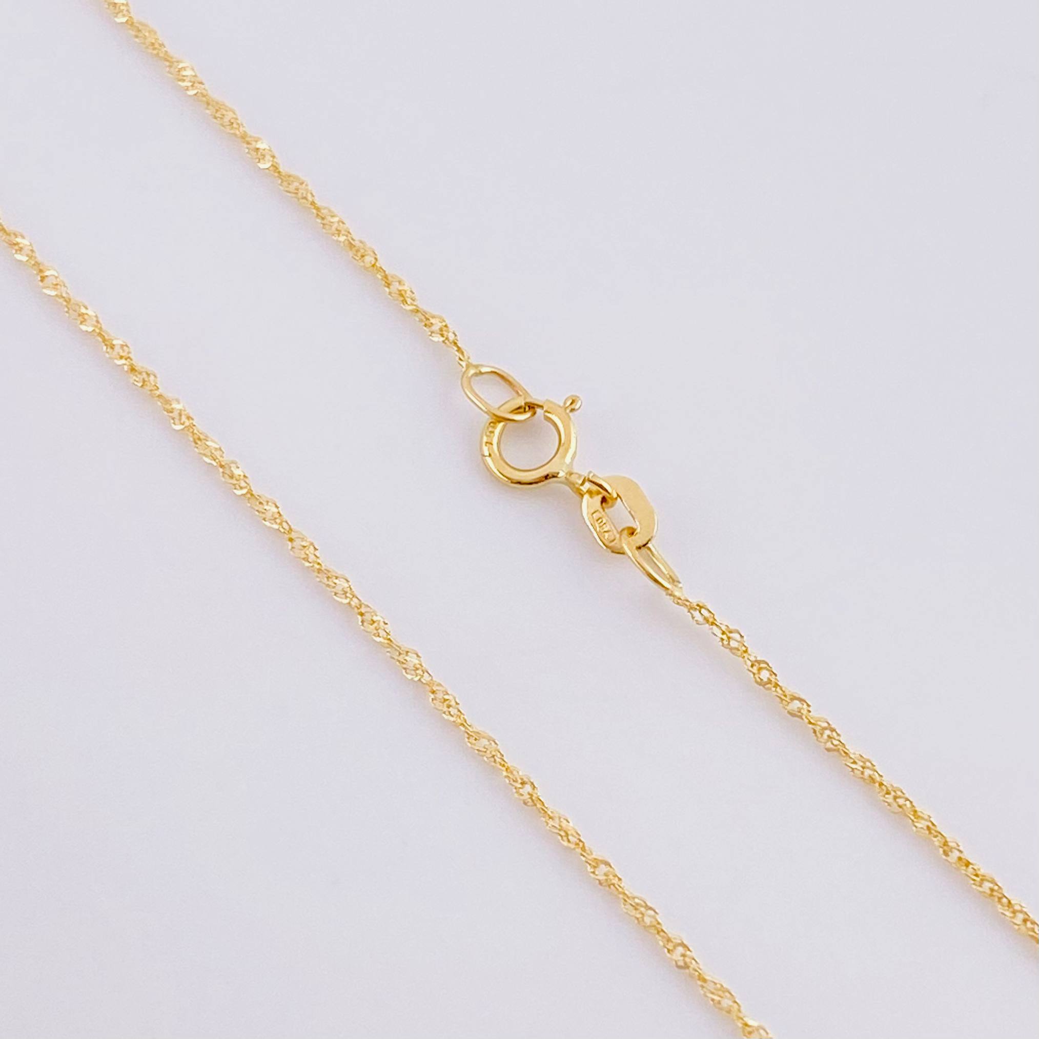 Set Cadena Singapur + Dije Silueta Corazón / 2.05g / 24 in Oro Amarillo 18K