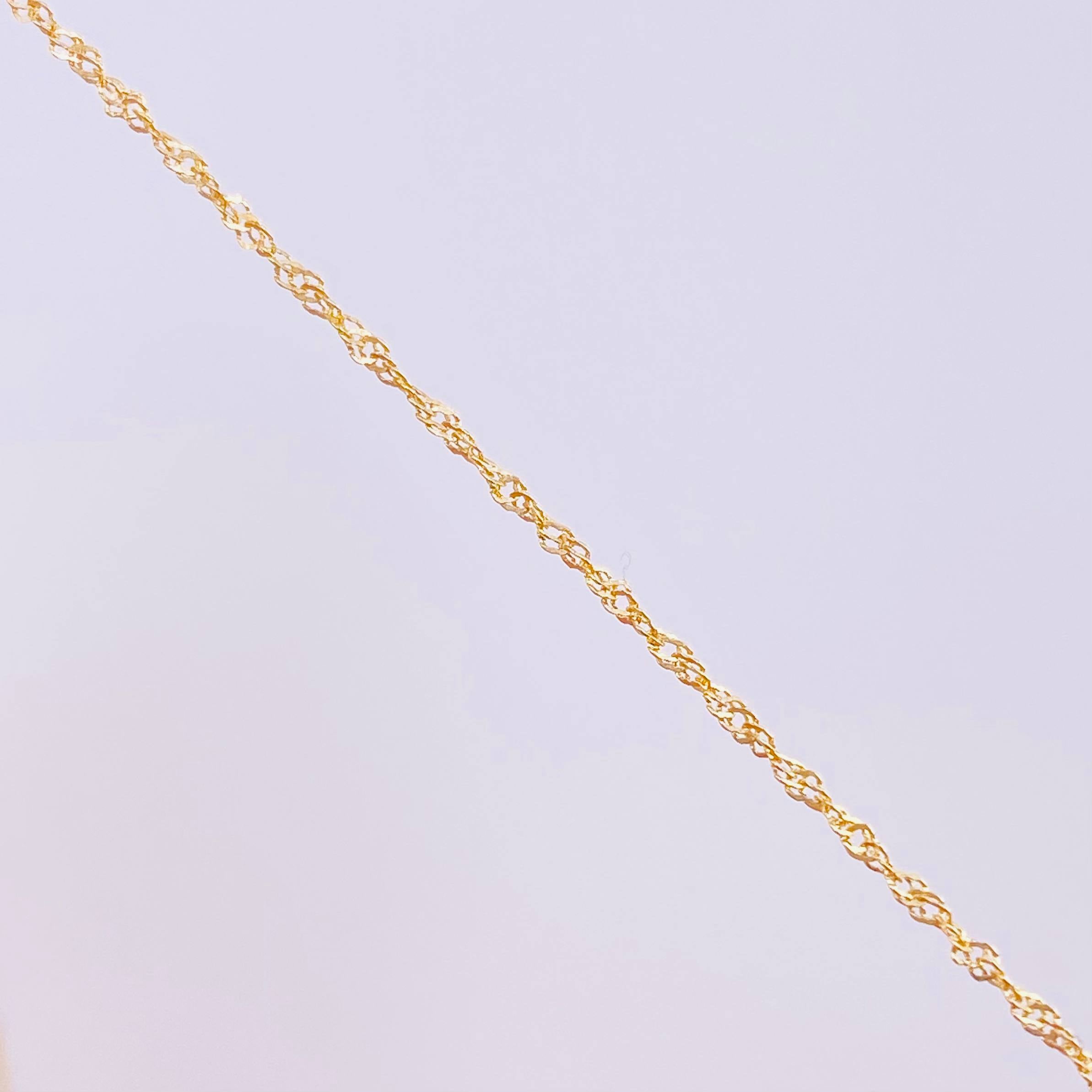 Set Cadena Singapur + Dije Silueta Corazón / 2g / 24 in Oro Amarillo 18K