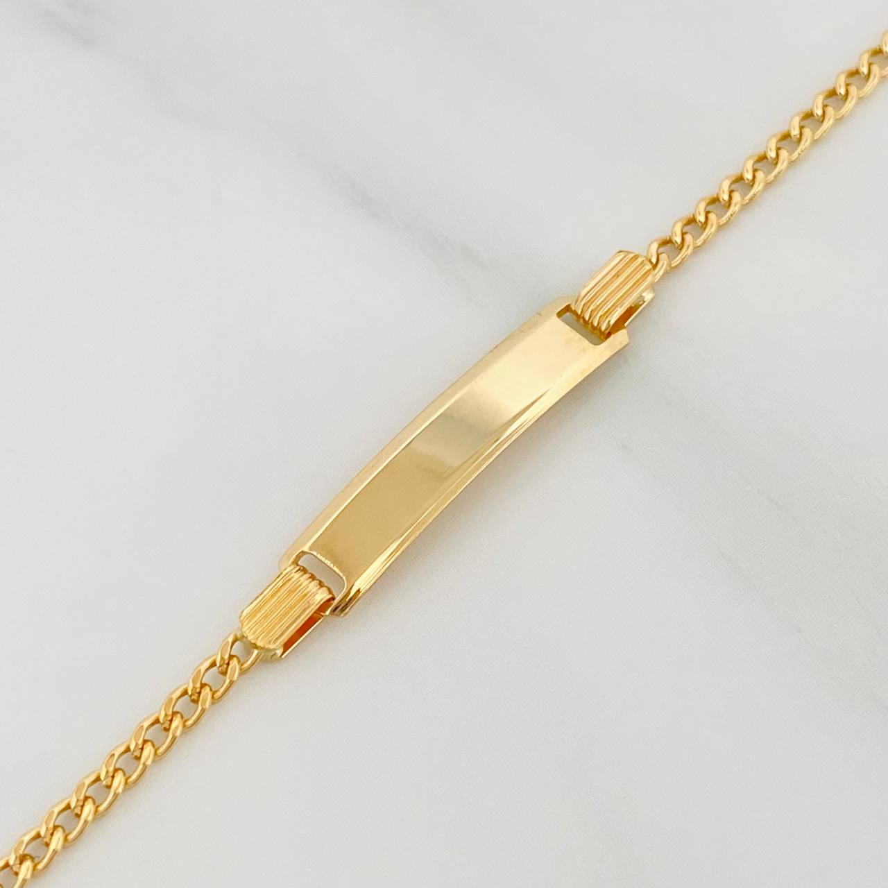 Pulso Placa Rectangular 1.65 g / 6 1/4 in / 22.07 mm Oro Amarillo 18K