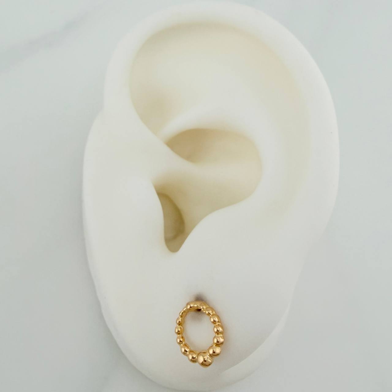 Topos Circulo Tupido 0.9gr / 7.5mm Oro Amarillo 18K %