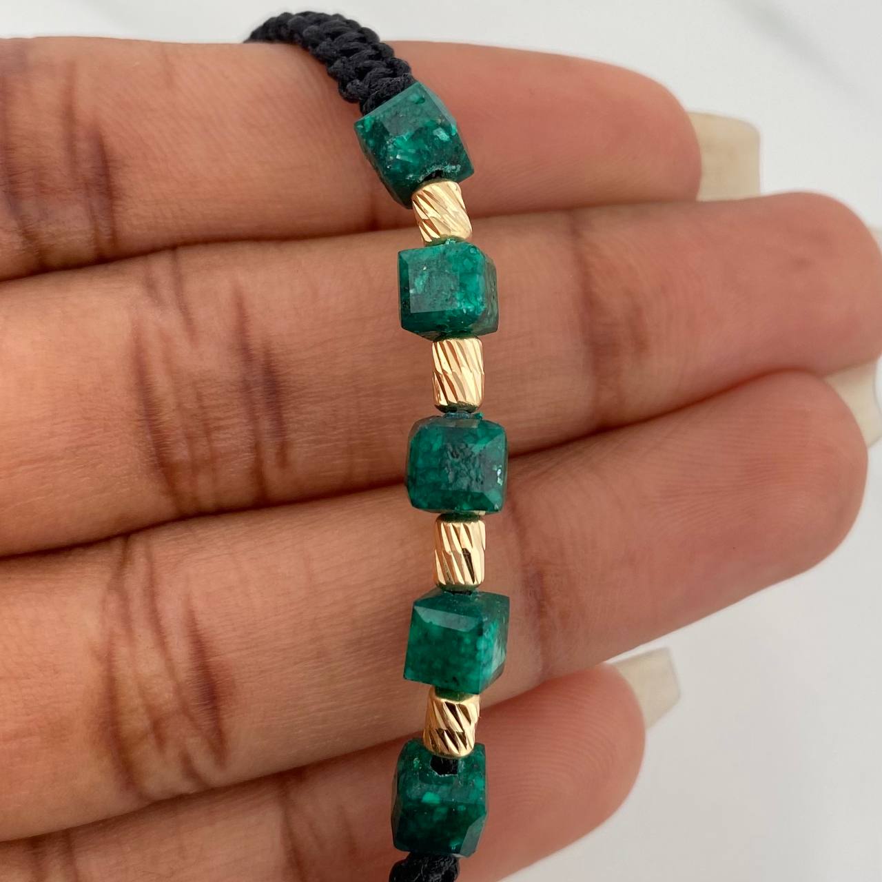 Pulsera Negra Morralla Cubica 5mm Cilindros 4 und Oro Amarillo 18K %