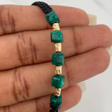 Pulsera Negra Morralla Cubica 5mm Cilindros 4 und Oro Amarillo 18K %