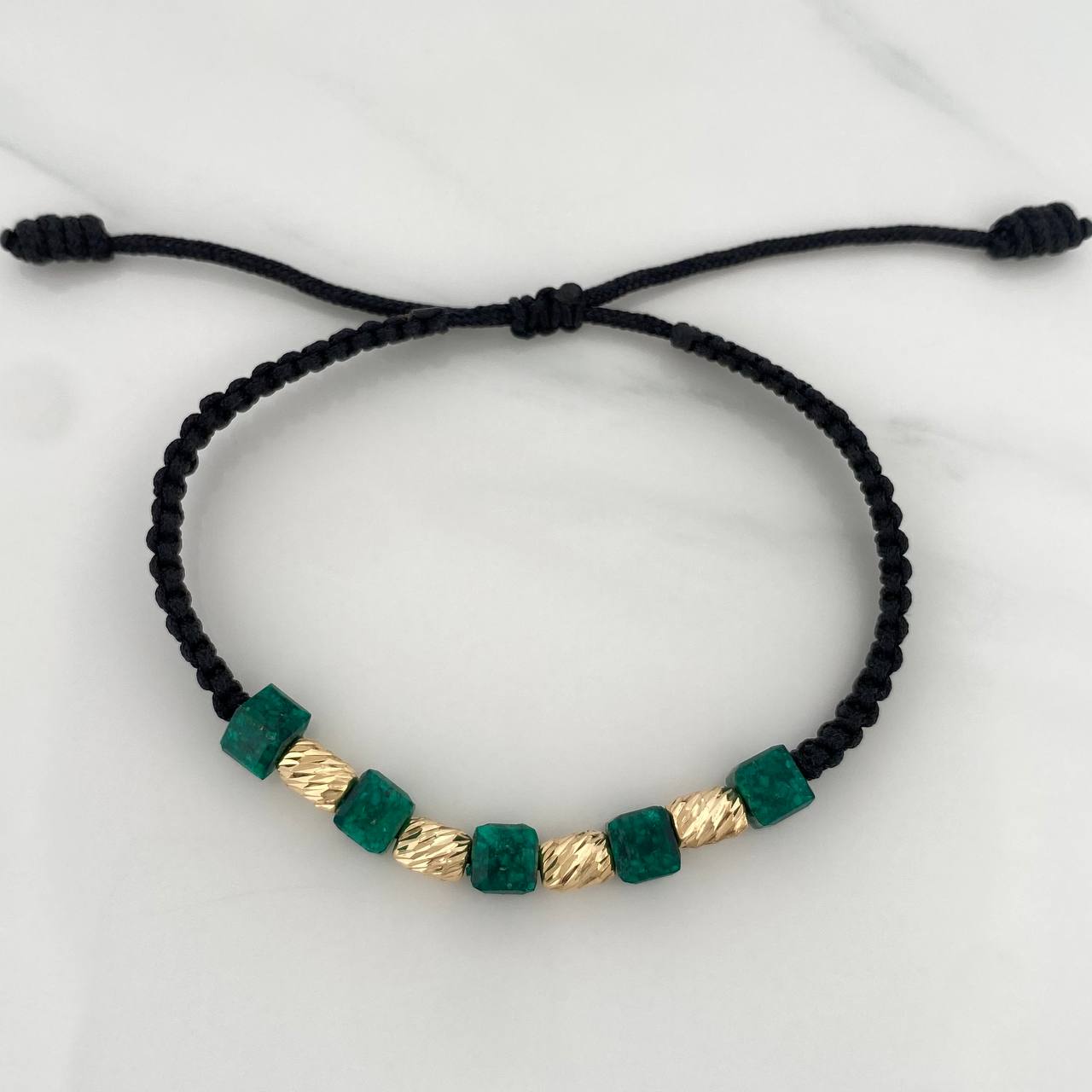 Pulsera Negra Morralla Cubica 5mm Cilindros 4 und Oro Amarillo 18K $