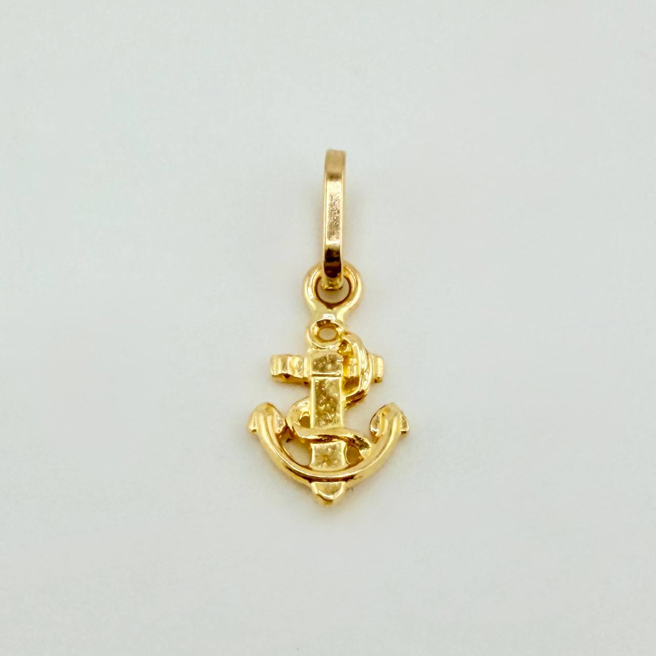 Dije Ancla 0.3gr / 1/2 in / Oro Amarillo 18K