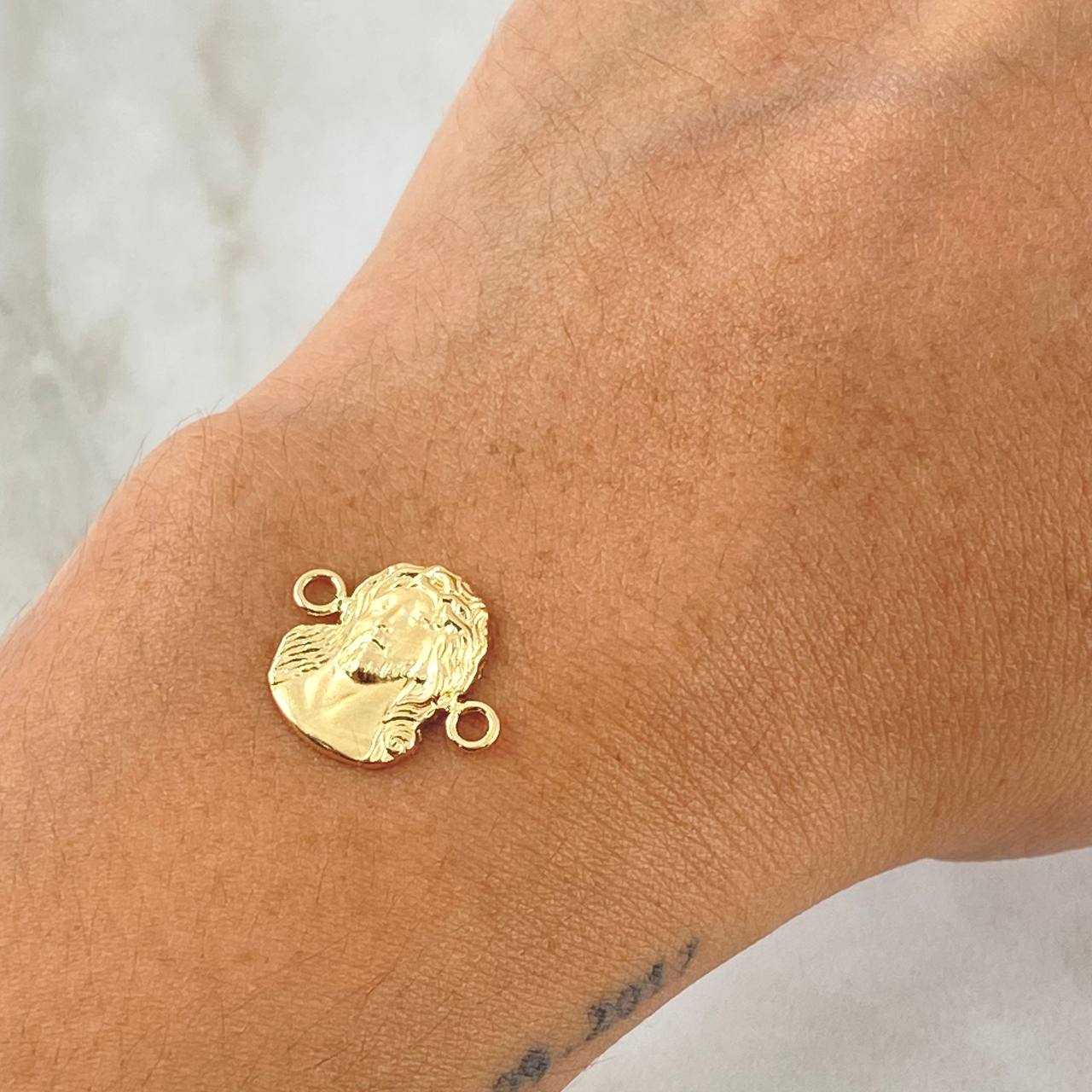 Herraje Rostro Jesus 0.6gr / 1.5cm / Oro 18K