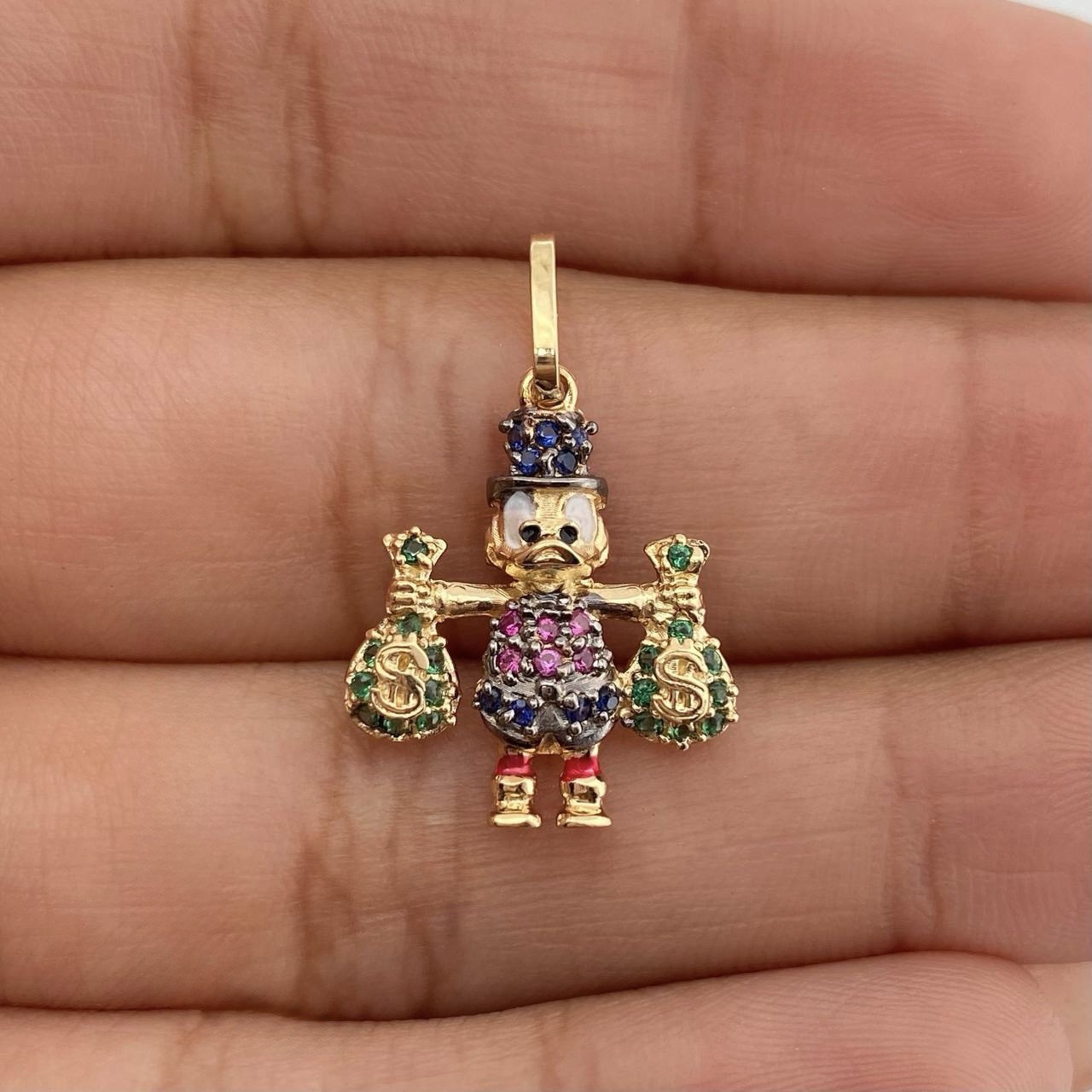 Dije Pato Bolsas de Dinero 1.7gr / 1 in / Dos Oros Negro Amarillo 18K %
