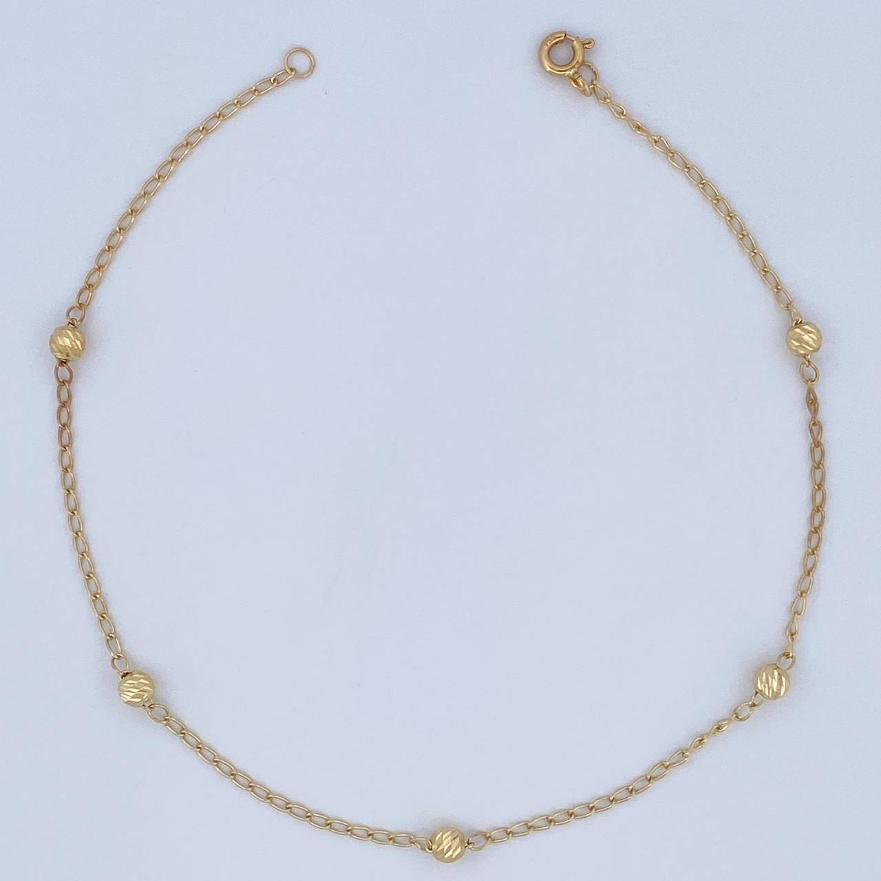Tobillera Espiga Militar 1.8gr / 25cm / 4mm Bolas Diamantadas Oro Amarillo 18K &