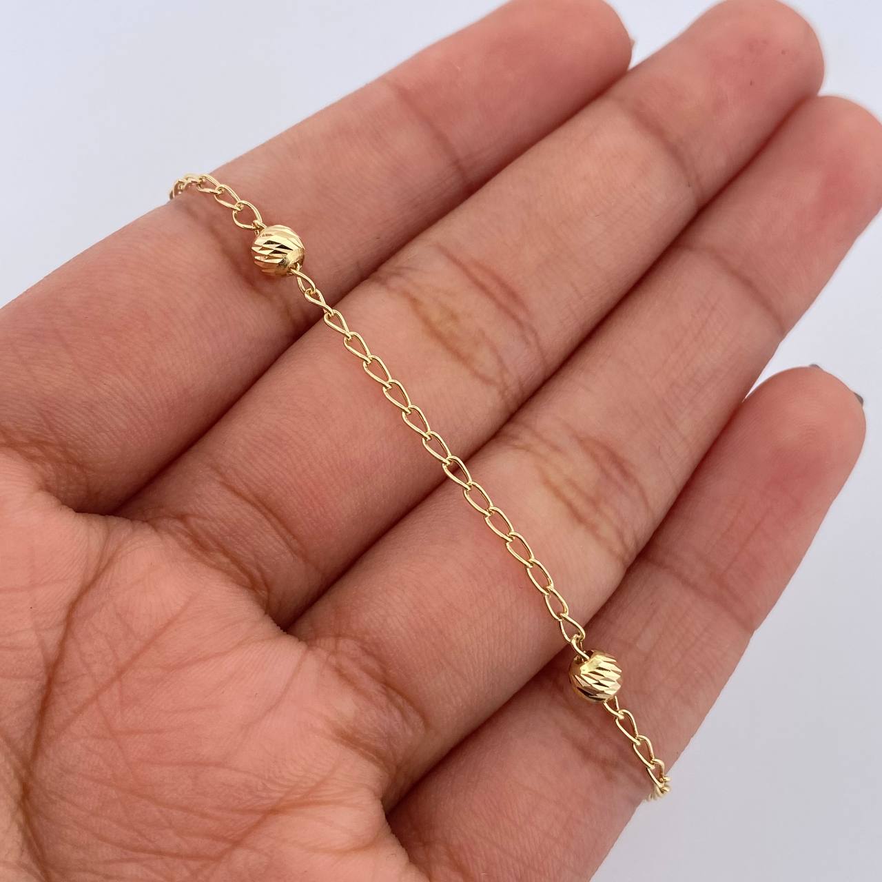 Tobillera Espiga Militar 1.8gr / 25cm / 4mm Bolas Diamantadas Oro Amarillo 18K &