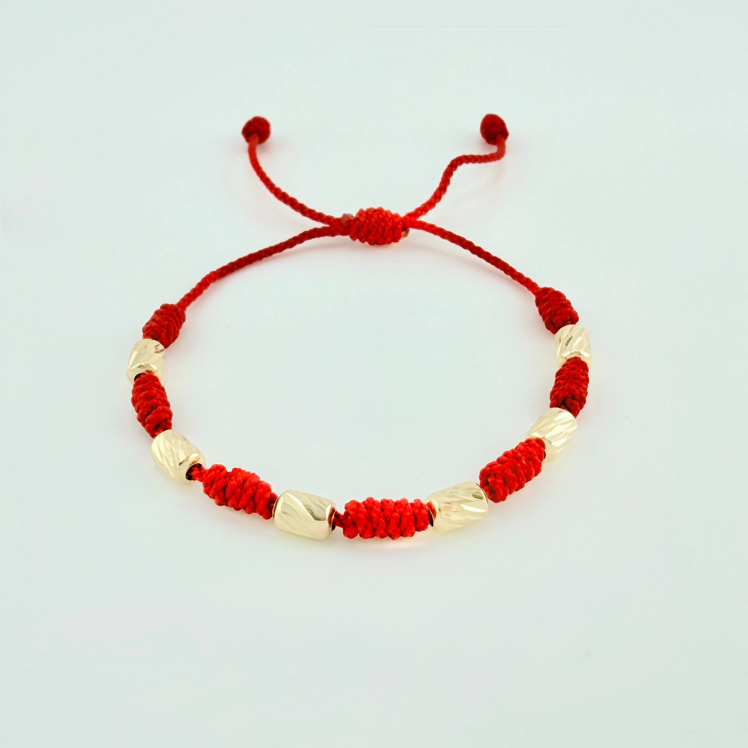 Pulsera Roja Cilindros 6und / Oro Amarillo 18K ©