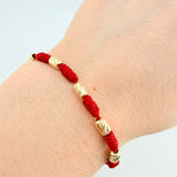 Pulsera Roja Cilindros 6und / Oro Amarillo 18K ©