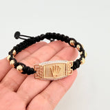 Pulsera Tejida Negra Placa Punteada Corona Bolas Diamantadas Dos Oros Amarillo Blanco 18K